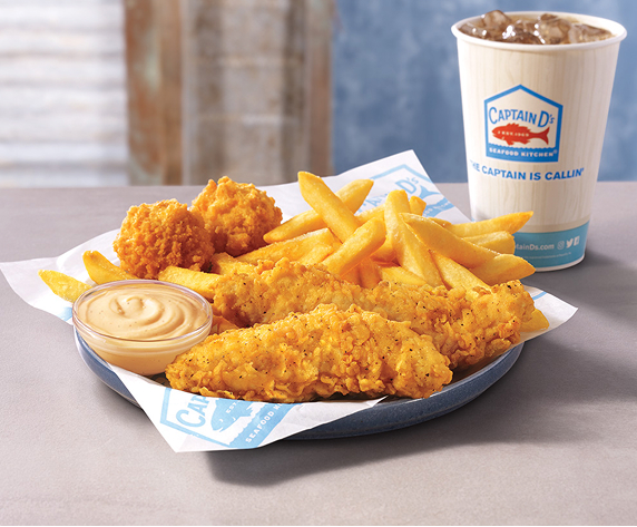 Fried seafood, fries, dip and a drink